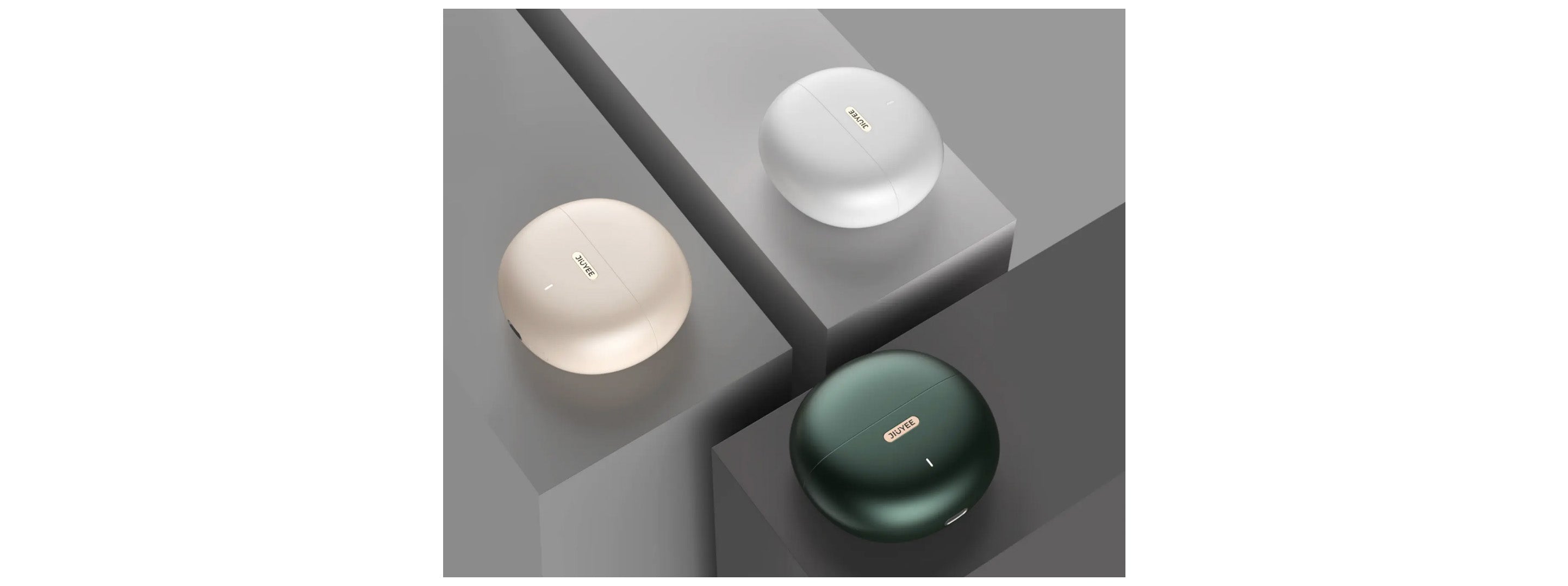 An image on the JIUYEE Free hearing aids details page displaying three different color options for the hearing aid: Emerable Green, Pearl White, and Gold.